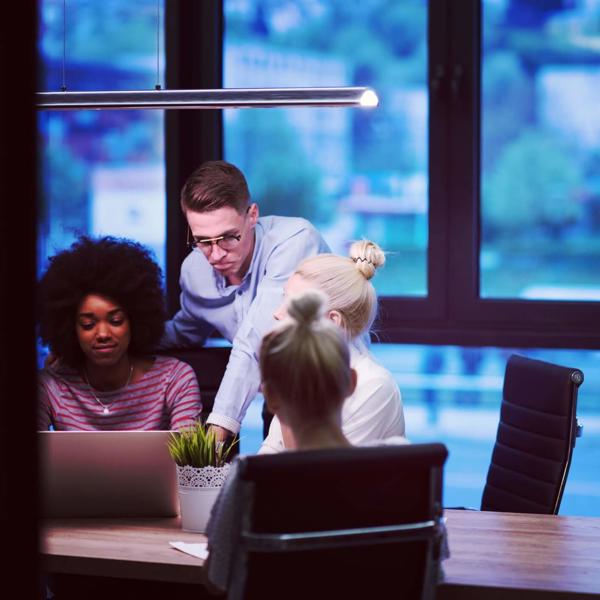 a group of people in an office